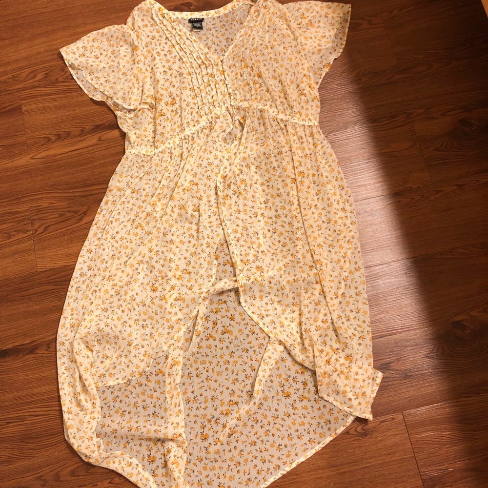 Sheer top looks great with jeans or over a dress